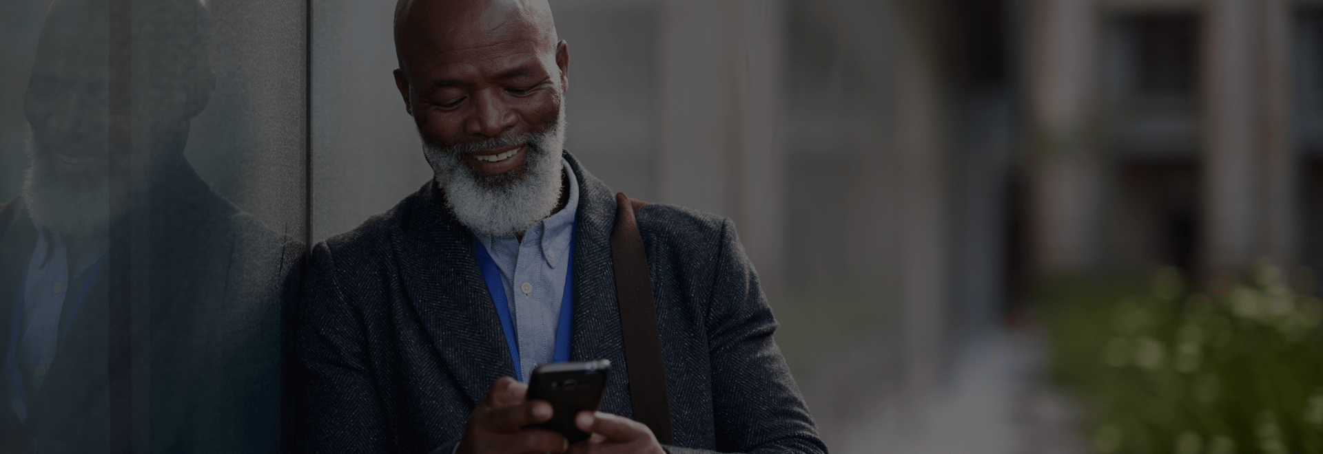 Elderly Businessman Using Phone