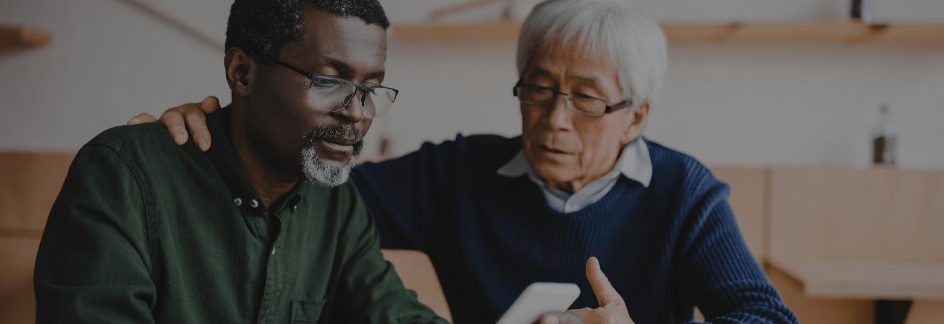 Elderly men using phone